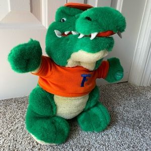 UF 11 inch tall stuffed GATOR toy with original tag. (Fight song does NOT work)